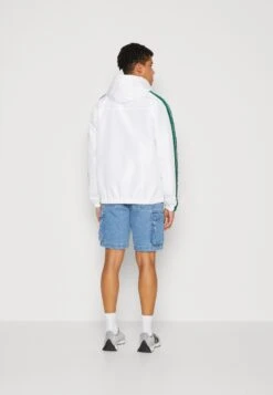 Ellesse Blair Unisex - Windjack - White 8 Ellesse Blair Unisex - Windjack - White -Modex Winkel 1923237c173c490ab1079fd09519aa9e