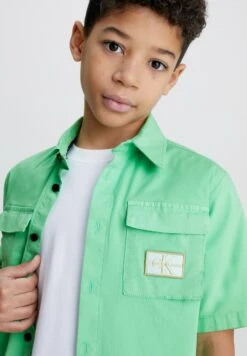 Calvin Klein Jeans Lichte Jas - Neptunes Wave 8 Calvin Klein Jeans Lichte Jas - Neptunes Wave -Modex Winkel 1a6d0737c9a043199b38aa83a78fa78c