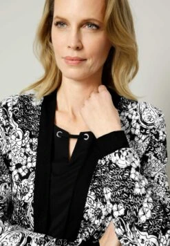 Lichte Jas - Schwarz/Weiß -Modex Winkel 7094b67095374ab282266a06977297d0