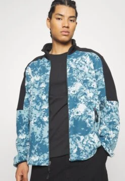 The North Face Fleecejas - Blue Coral/Smoke -Modex Winkel 70e06ba3b7e64438a47c70c49e3a50e7