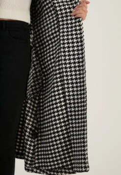 LELA Loose Fit - Trenchcoat - Black 11 LELA Loose Fit - Trenchcoat - Black -Modex Winkel 7c1d40f106ff4e4eae69a24b77a736da