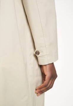 Hugo Munir - Trenchcoat - Light Beige -Modex Winkel 7ef95c3427134101afbfa0ebfce24d6f