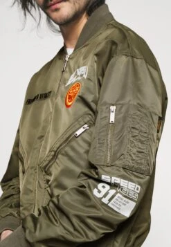 Evisu Kamon Jacket - Bomberjacks - Dark Olive -Modex Winkel 9a6409586da246d085c9b12efd4aa42a