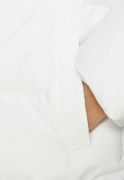 Rains Alta Long Puffer Unisex - Winterjas - Powder -Modex Winkel a1e407cbb768471495fcfbfe3196fdfc