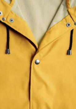 Stutterheim Stockholm Lightweight - Regenjas - Yellow -Modex Winkel a6db566e4fd346ee90ab4d30c2156cd1