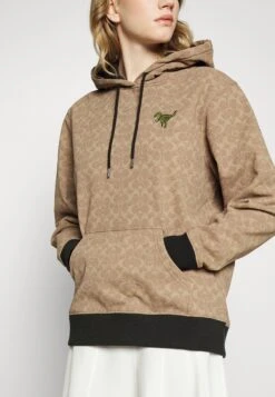 Coach Gifting Rexy Hoodie - Sweater - Beige -Modex Winkel a80c5406b97446419c724fbf81ad144f