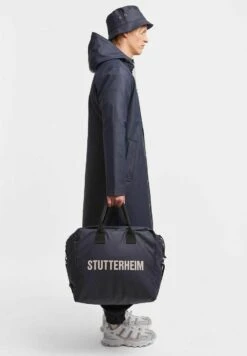 Stutterheim Stockholm- Regenjas - Navy -Modex Winkel dad91dddd838461bb09ae1272457b5e2