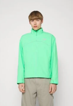 The North Face Tek Piping Wind Jacket - Windjack - Chlorophyll Green -Modex Winkel ebe70412060a49b29d4afa31df1aea37